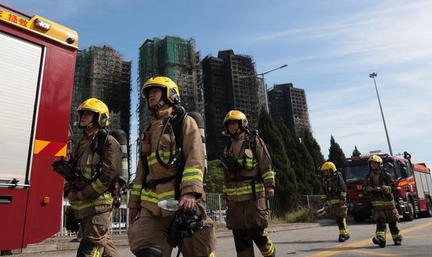 홍콩 아파트 화재 숨은 영웅들